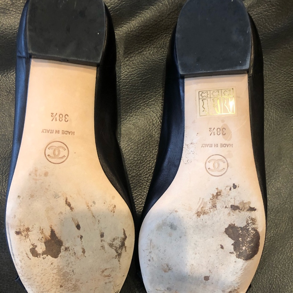 CHANEL Black Flats with Gold chanel logo